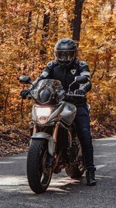 Preview wallpaper motorcycle, bike, motorcyclist, helmet, road, autumn