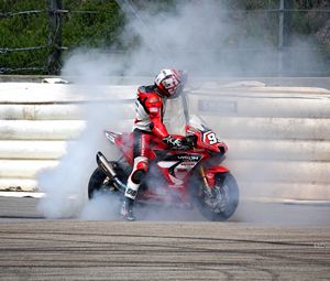 Preview wallpaper motorcycle, bike, motorcyclist, motorcycle racing, smoke, drift
