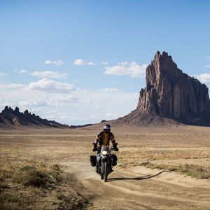 Preview wallpaper motorcycle, bike, motorcyclist, biker, rock, desert