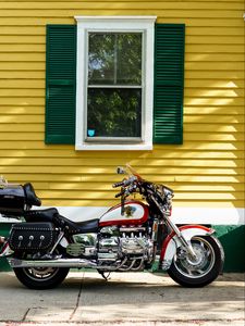 Preview wallpaper motorcycle, bike, red, house, yellow