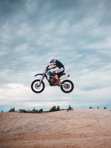 Preview wallpaper motorcycle, bike, side view, motorcyclist, helmet, jump