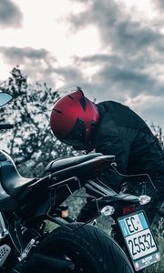 Preview wallpaper motorcycle, black, motorcyclist, helmet