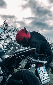 Preview wallpaper motorcycle, black, motorcyclist, helmet
