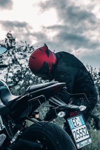 Preview wallpaper motorcycle, black, motorcyclist, helmet