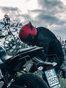 Preview wallpaper motorcycle, black, motorcyclist, helmet