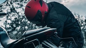 Preview wallpaper motorcycle, black, motorcyclist, helmet