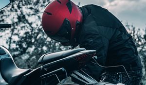 Preview wallpaper motorcycle, black, motorcyclist, helmet
