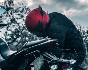 Preview wallpaper motorcycle, black, motorcyclist, helmet