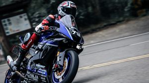 Preview wallpaper motorcycle, blue, bike, motorcyclist, biker, slope, track
