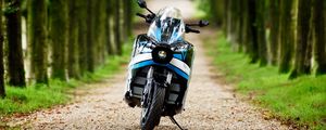 Preview wallpaper motorcycle, blue, forest, trees
