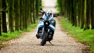 Preview wallpaper motorcycle, blue, forest, trees