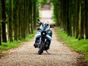 Preview wallpaper motorcycle, blue, forest, trees