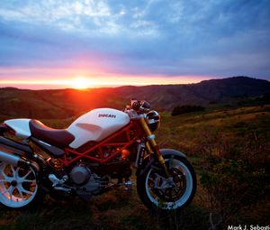 Preview wallpaper motorcycle, ducati, sunlight, sunset