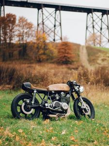 Preview wallpaper motorcycle, grass, leaves, dry