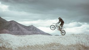 Preview wallpaper motorcycle, helmet, jump