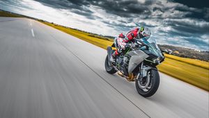 Preview wallpaper motorcycle, motorcyclist, bike, sports, speed, road
