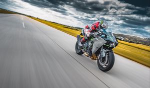 Preview wallpaper motorcycle, motorcyclist, bike, sports, speed, road