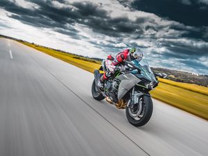 Preview wallpaper motorcycle, motorcyclist, bike, sports, speed, road