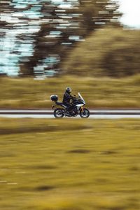 Preview wallpaper motorcycle, motorcyclist, bike, helmet, blur