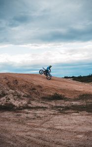 Preview wallpaper motorcycle, motorcyclist, bike, slope, sky