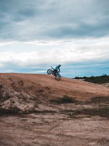 Preview wallpaper motorcycle, motorcyclist, bike, slope, sky