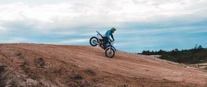 Preview wallpaper motorcycle, motorcyclist, bike, slope, sky