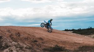 Preview wallpaper motorcycle, motorcyclist, bike, slope, sky