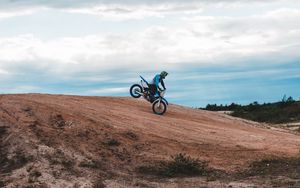 Preview wallpaper motorcycle, motorcyclist, bike, slope, sky
