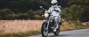 Preview wallpaper motorcycle, motorcyclist, bike, white, road, speed