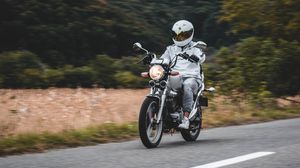 Preview wallpaper motorcycle, motorcyclist, bike, white, road, speed
