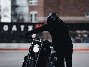 Preview wallpaper motorcycle, motorcyclist, bike, helmet, black