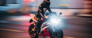 Preview wallpaper motorcycle, motorcyclist, bike, road, light, speed