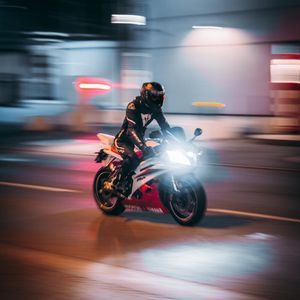 Preview wallpaper motorcycle, motorcyclist, bike, road, light, speed