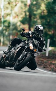 Preview wallpaper motorcycle, motorcyclist, bike, sport bike, black, moto