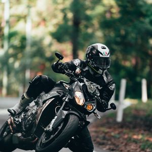 Preview wallpaper motorcycle, motorcyclist, bike, sport bike, black, moto