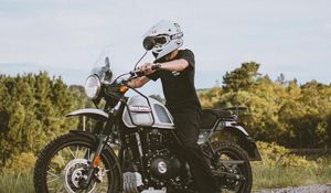 Preview wallpaper motorcycle, motorcyclist, biker, helmet, bike, gray