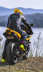 Preview wallpaper motorcycle, motorcyclist, biker, bike, moto, yellow