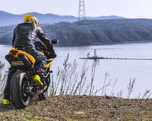 Preview wallpaper motorcycle, motorcyclist, biker, bike, moto, yellow