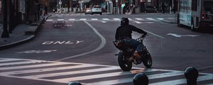 Preview wallpaper motorcycle, motorcyclist, black, road, city, traffic lights