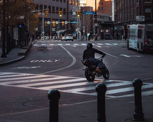 Preview wallpaper motorcycle, motorcyclist, black, road, city, traffic lights