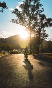 Preview wallpaper motorcycle, motorcyclist, child, road, sunset