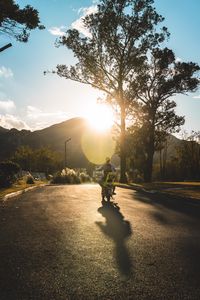 Preview wallpaper motorcycle, motorcyclist, child, road, sunset