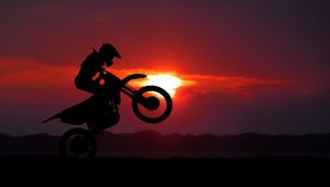 Preview wallpaper motorcycle, motorcyclist, cross, stunt, silhouette, sunset