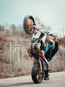 Preview wallpaper motorcycle, motorcyclist, helmet, stunt