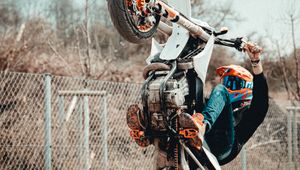 Preview wallpaper motorcycle, motorcyclist, helmet, stunt
