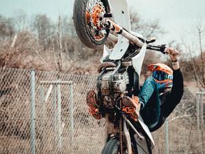 Preview wallpaper motorcycle, motorcyclist, helmet, stunt