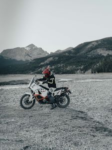 Preview wallpaper motorcycle, motorcyclist, helmet, bike, side view, mountains