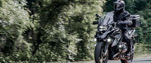 Preview wallpaper motorcycle, motorcyclist, helmet, bike, road