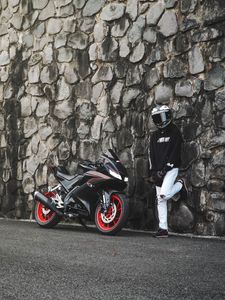 Preview wallpaper motorcycle, motorcyclist, helmet, bike, wall