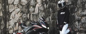 Preview wallpaper motorcycle, motorcyclist, helmet, bike, wall